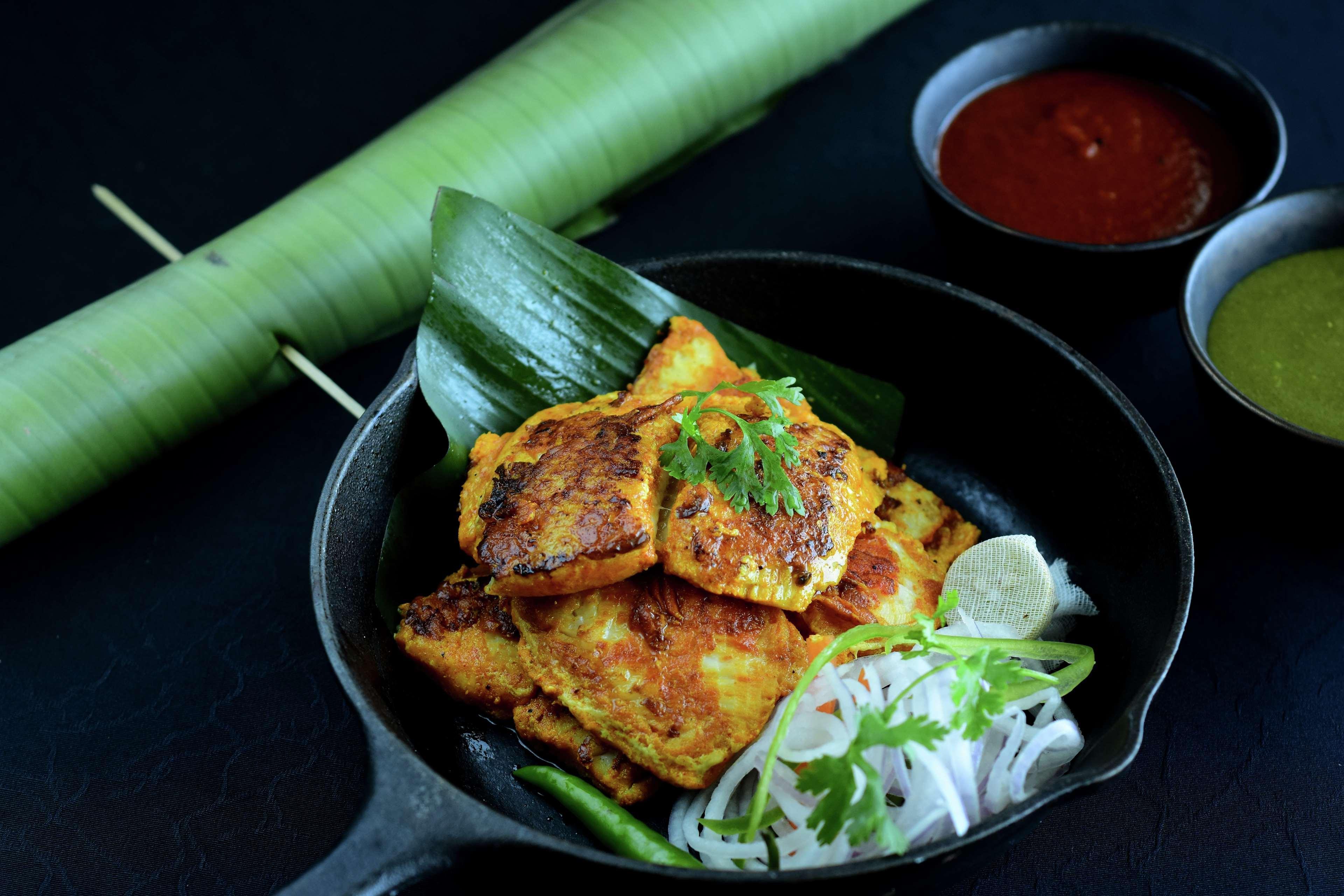 Hilton Mumbai International Airport Hotel Екстер'єр фото A plate of opek